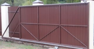 Купить откатные ворота из профнастила Тихвин, цена от 1778 руб.